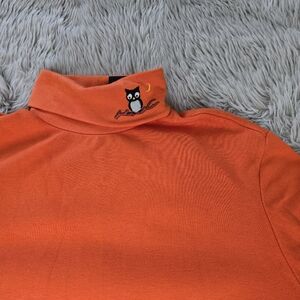 Embroidered owl turtleneck